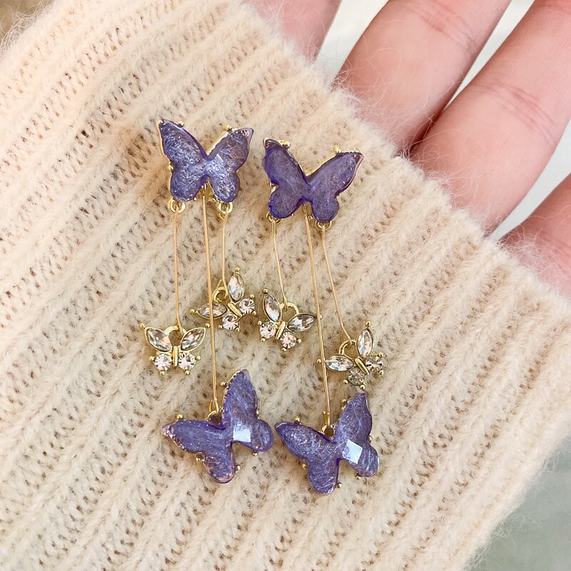 ARETES MARIPOSA PURPURA